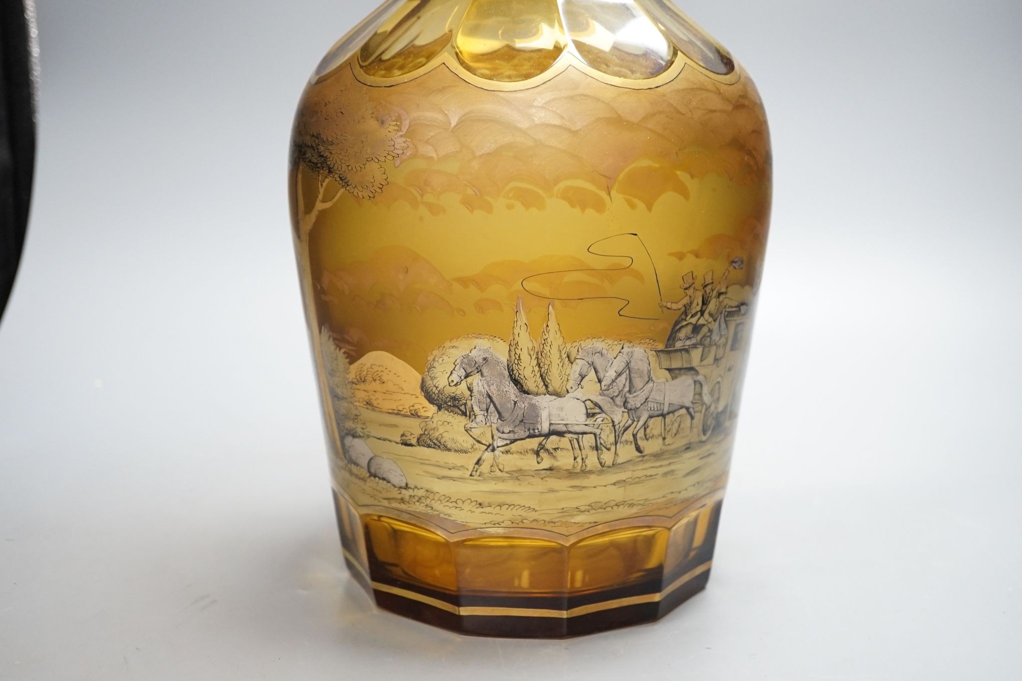 A large amber glass decanter and stopper, 74cm